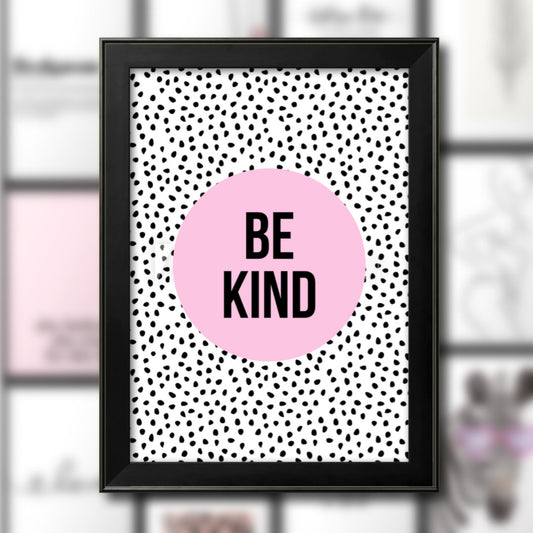 Be kind quote on spotty black and white background